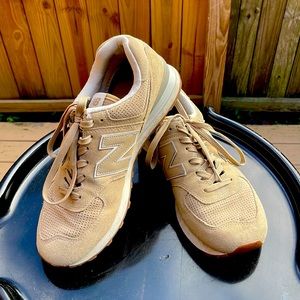 Mens New Balance 574 size 10, in beige. Trendy retro look.